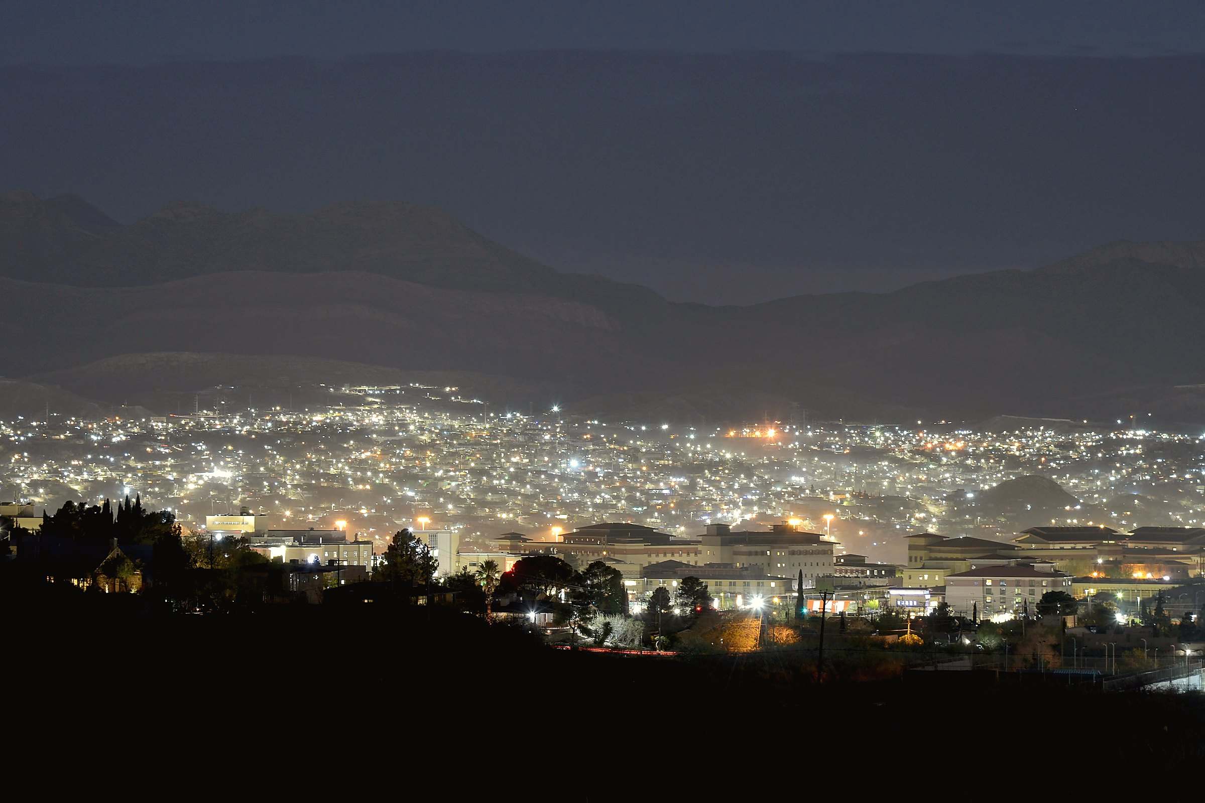 El Paso and Ciudad Juárez lit up at night, seen from the Franklin Mountains