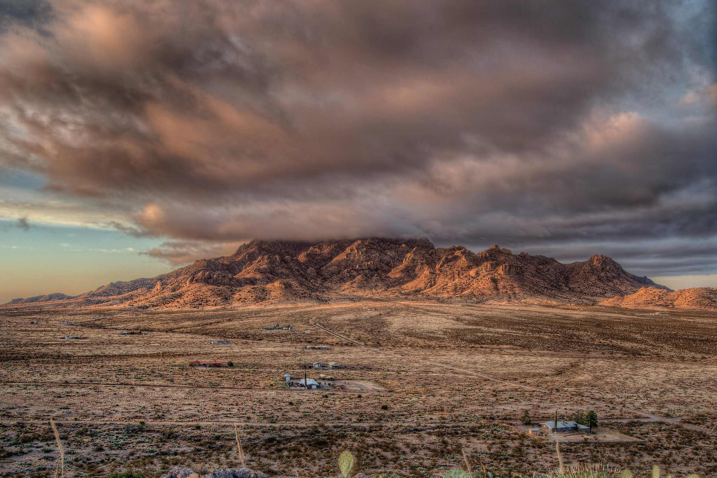 Heavy clouds at dawn over Florida Peak, seen from Rockhound State Park near Deming, New Mexico
