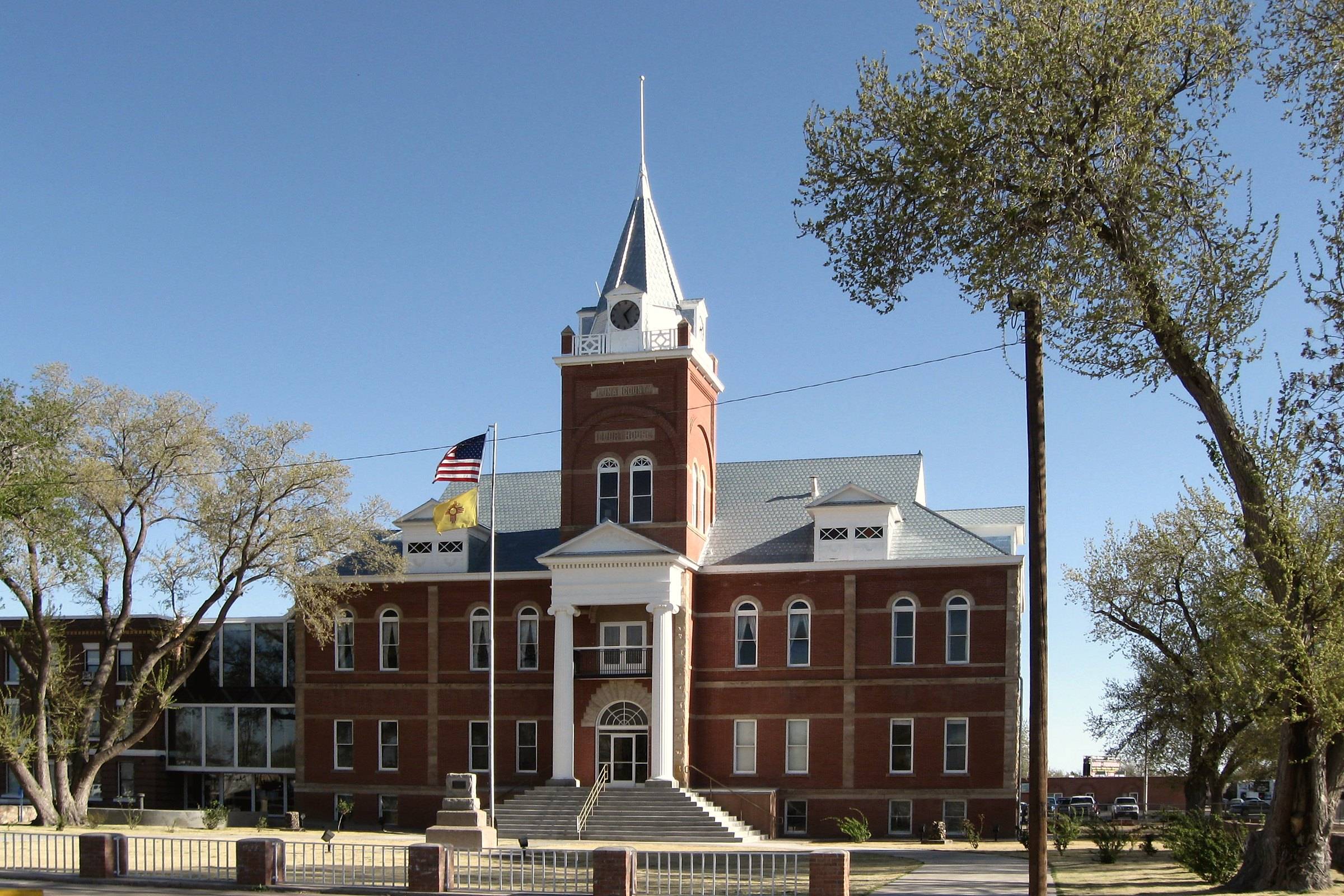The red-brick Luna County Courthouse and its tower in Deming, New Mexico