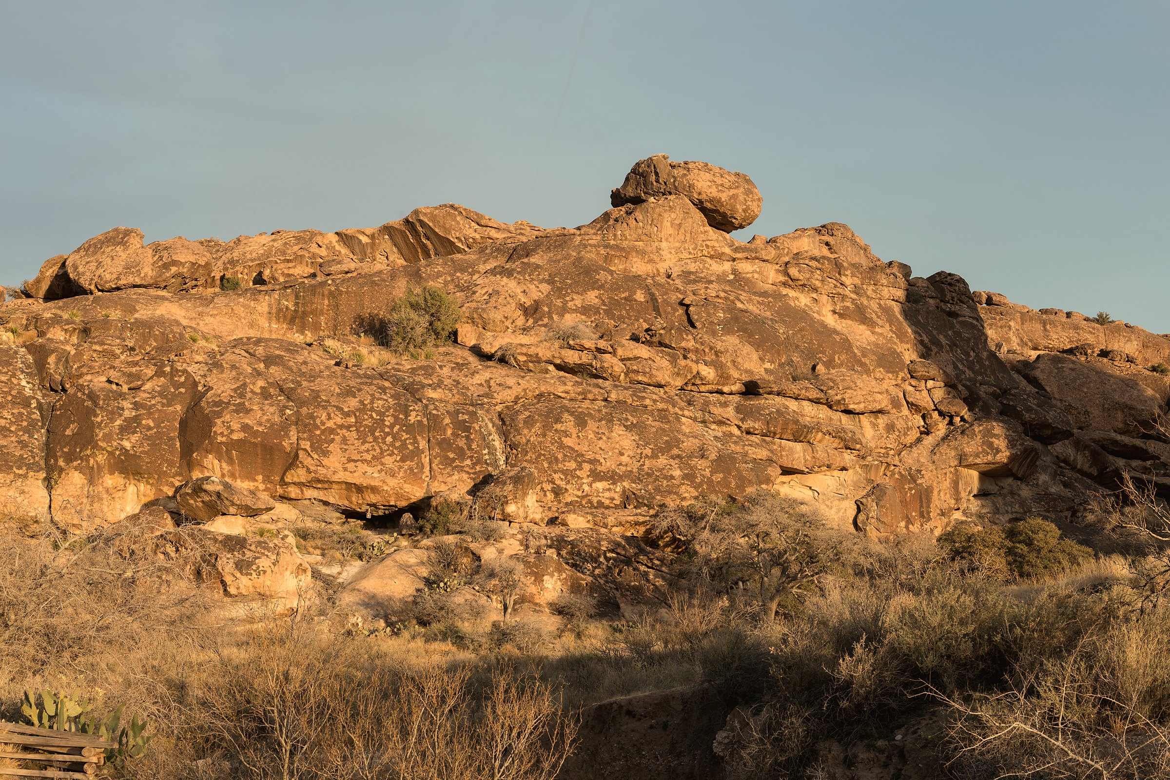 Warm light on the boulders of Hueco Tanks State Park and Historic Site in El Paso County, Texas