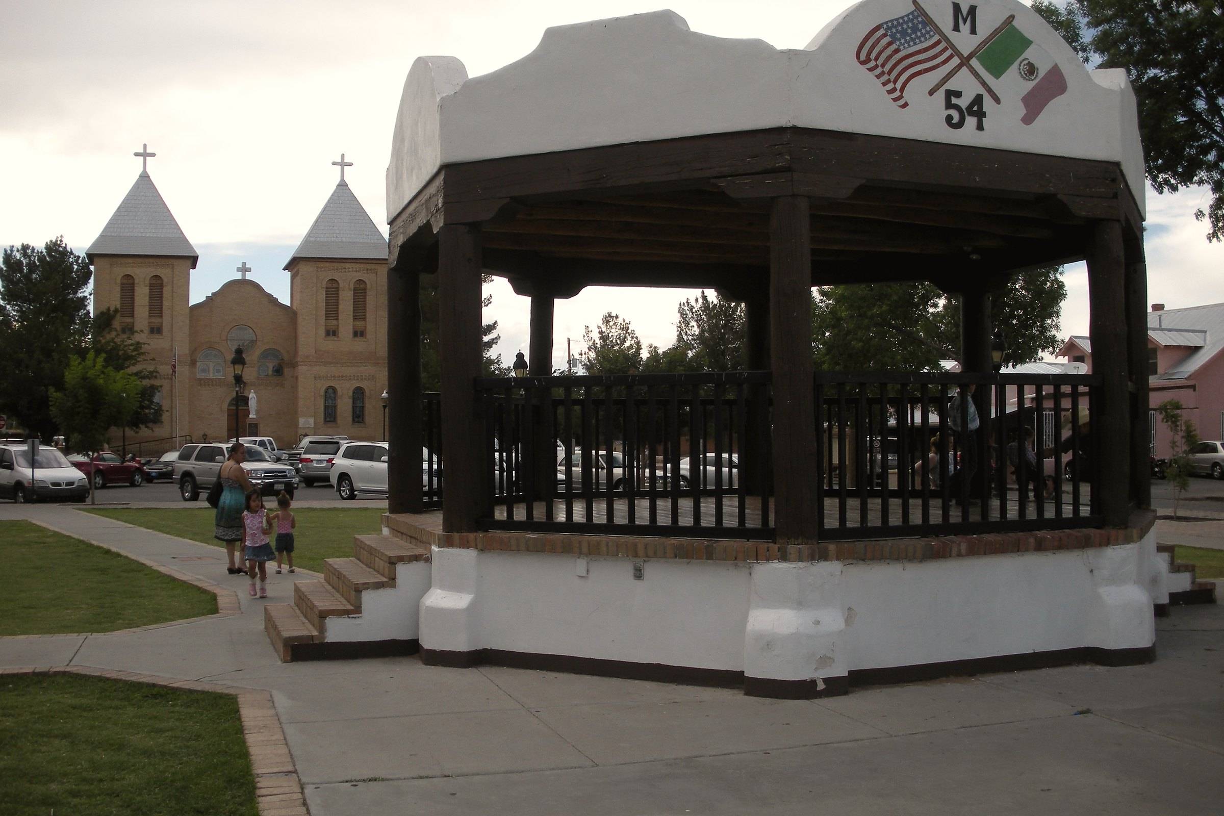 The bandstand on Mesilla Plaza with the towers of the Basilica of San Albino behind it